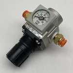 Smc AR20-N02E-Z-X406 Modular Pressure Regulator 1/4" Npt W/tube Connectors. Fixed Price $22.99.