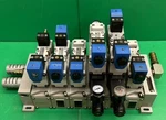 Parker Pneumatic Manifold W/ 5 Solenoid Valves. Fixed Price $360.00.