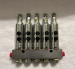 Incoln Industrial 83749-5 SL-44 5-OUTLET Oil/grease Injector Unit New Oem. Fixed Price $225.00.