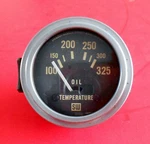 Vintage Stewart Warner # 428077 Oil Temperature Gauge 12 Volt 1/16" 100 - 325. Fixed Price $36.00.
